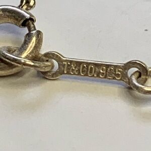Tiffany & Co. Silver Cross Necklace! Super 🥰 cute and dainty cross.